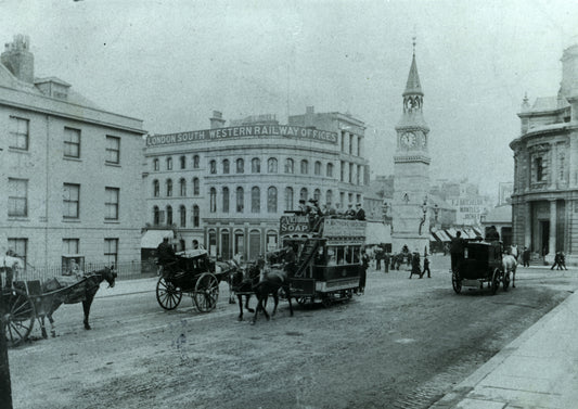 Horse-drawn vehicles in front of Derry's Clock in the 1900s, Print